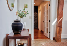 Radiant Brass Bands Black Adult Cremation Urn - Lifestyle