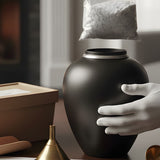Are Ashes Loose in an Urn? How Cremains Are Packaged and How to Transfer Them - Funeral.com, Inc.