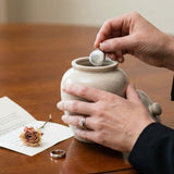 Can You Add Items to Cremation Ashes? Meaningful Mementos (and What to Avoid) - Funeral.com, Inc.