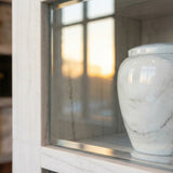 How Big Is a Cremation Urn? Sizes, Cubic Inches, and What Fits in a Columbarium Niche - Funeral.com, Inc.