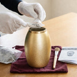 How to Fill a Cremation Urn (and What an “Urn Filler” Is): Tools, Tips, and Clean Transfers - Funeral.com, Inc.