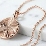Fingerprint Jewelry & Memorial Urns: A Guide to Meaningful Memorialization