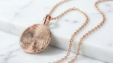Fingerprint Jewelry & Memorial Urns: A Guide to Meaningful Memorialization