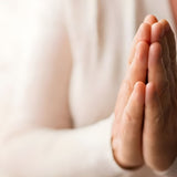 Praying Hands Symbolism and Personalized Memorial Urns