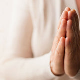 Praying Hands Meaning: Symbolism, Tattoo Ideas, and Praying Hands Memorial Urns - Funeral.com, Inc.