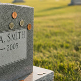 The Meaning of Coins on Headstones: Pennies, Nickels, Dimes, and Quarters Explained - Funeral.com, Inc.