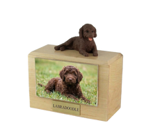 Wooden Pet Urn with Lying Down Chocolate Labradoodle Figurine & 4x6 Inches Photo Holder