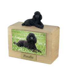 Urna de madera para mascotas con figura de border terrier sentado y portafotos de 10 x 15 cm