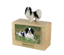 Wooden Pet Urn with Standing Black and White Japanese Chin Figurine & 4x6 Inches Photo Holder