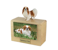 Wooden Pet Urn with Standing Red and White Japanese Chin Figurine & 4x6 Inches Photo Holder