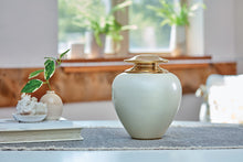 High Gloss Pearl Brass Adult Cremation Urn with Brass Lid - Lifestyle