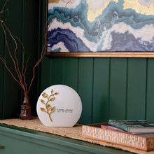 White & Brass Aluminum Adult Cremation Urn with Cherry Blossom Design - Lifestyle