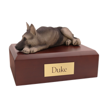 Black and Silver German Shepherd, Resting Figurine Pet Cremation Urn - Funeral.com, Inc.