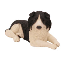 Black and White Border Collie, Lying Down Figurine Pet Cremation Urn - Funeral.com, Inc.