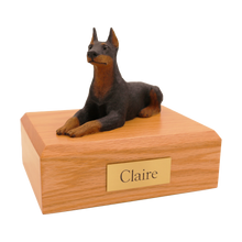Black Doberman, Lying Down Figurine Pet Cremation Urn - Funeral.com, Inc.