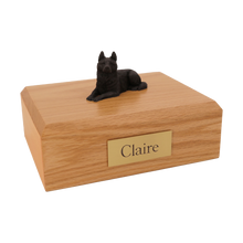 Black German Shepherd, Lying Down Figurine Pet Cremation Urn - Funeral.com, Inc.