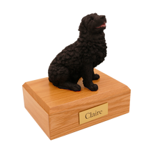 Black Newfoundland, Sitting Figurine Pet Cremation Urn - Funeral.com, Inc.