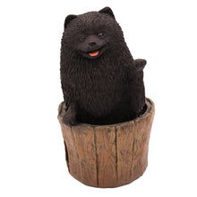 Black Pomeranian, Sitting in Tree Stump Figurine Pet Cremation Urn - Funeral.com, Inc.