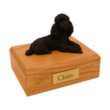 Black Poodle, Lying Down Figurine Pet Cremation Urn - Funeral.com, Inc.