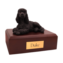 Black Poodle, Resting Figurine Pet Cremation Urn - Funeral.com, Inc.