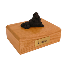 Black Poodle, Show Cut Lying Figurine Pet Cremation Urn - Funeral.com, Inc.