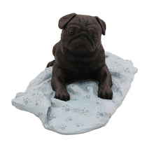 Black Pug, Lying Down on a Blanket Figurine Pet Cremation Urn - Funeral.com, Inc.
