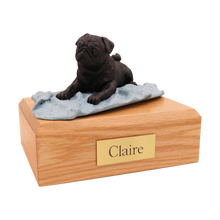 Black Pug, Lying Down on a Blanket Figurine Pet Cremation Urn - Funeral.com, Inc.