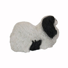 Black & White Pekingese, Lying Down Figurine Pet Cremation Urn - Funeral.com, Inc.