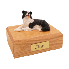 Border Collie, Lying Down Figurine Pet Cremation Urn - Funeral.com, Inc.