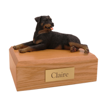 Female Rottweiler, Lying Down Figurine Pet Cremation Urn - Funeral.com, Inc.