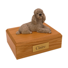 Gray Poodle, Lying Down Figurine Pet Cremation Urn - Funeral.com, Inc.