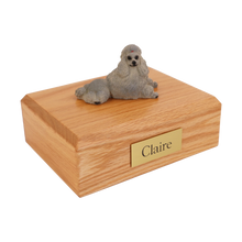 Gray Poodle, Show Cut Lying Down Figurine Pet Cremation Urn - Funeral.com, Inc.