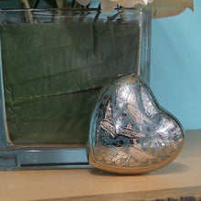 Nickel - Plated Brass Bird Engraved Heart Keepsake Urn - Funeral.com, Inc.