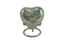 Nickel - Plated Brass Bird Engraved Heart Keepsake Urn - Funeral.com, Inc.