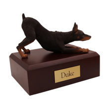 Red Doberman, Play Bowing Figurine Pet Cremation Urn - Funeral.com, Inc.