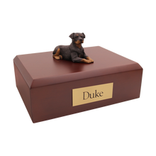 Rottweiler, Lying Down Figurine Pet Cremation Urn - Funeral.com, Inc.