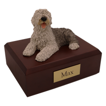 Sheepdog, Lying Down Figurine Pet Cremation Urn  - Funeral.com, Inc.