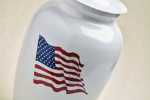 Shimmery White Stainless Steel Adult Cremation Urn with American Flag - Funeral.com, Inc.