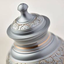 Silver Brass Large Urn with Hand - Etched Engraved Design - Funeral.com, Inc.