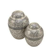 Silver Brass Medium Urn with Embossed Leaf and Vine Design - Funeral.com, Inc.