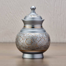 Silver Brass Medium Urn with Hand - Etched Engraved Design - Funeral.com, Inc.