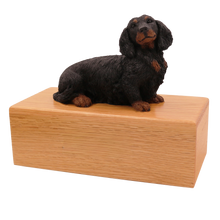Simply Series Black Longhaired Dachshund, Sitting Figurine Pet Cremation Urn - Funeral.com, Inc.