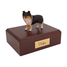 Tri - Color Sheltie, Standing Figurine Pet Cremation Urn - Funeral.com, Inc.