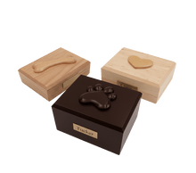 Wooden Traditional Pet Cremation Urn with Paw Print Adornment - Funeral.com, Inc.