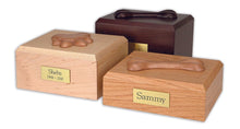 Wooden Traditional Pet Cremation Urn with Paw Print Adornment - Funeral.com, Inc.